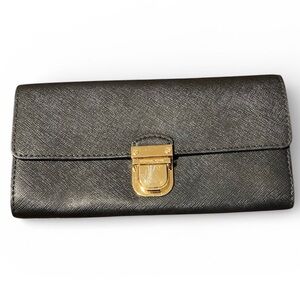Michael Kor’s Elegant Black Leather Plus wallet